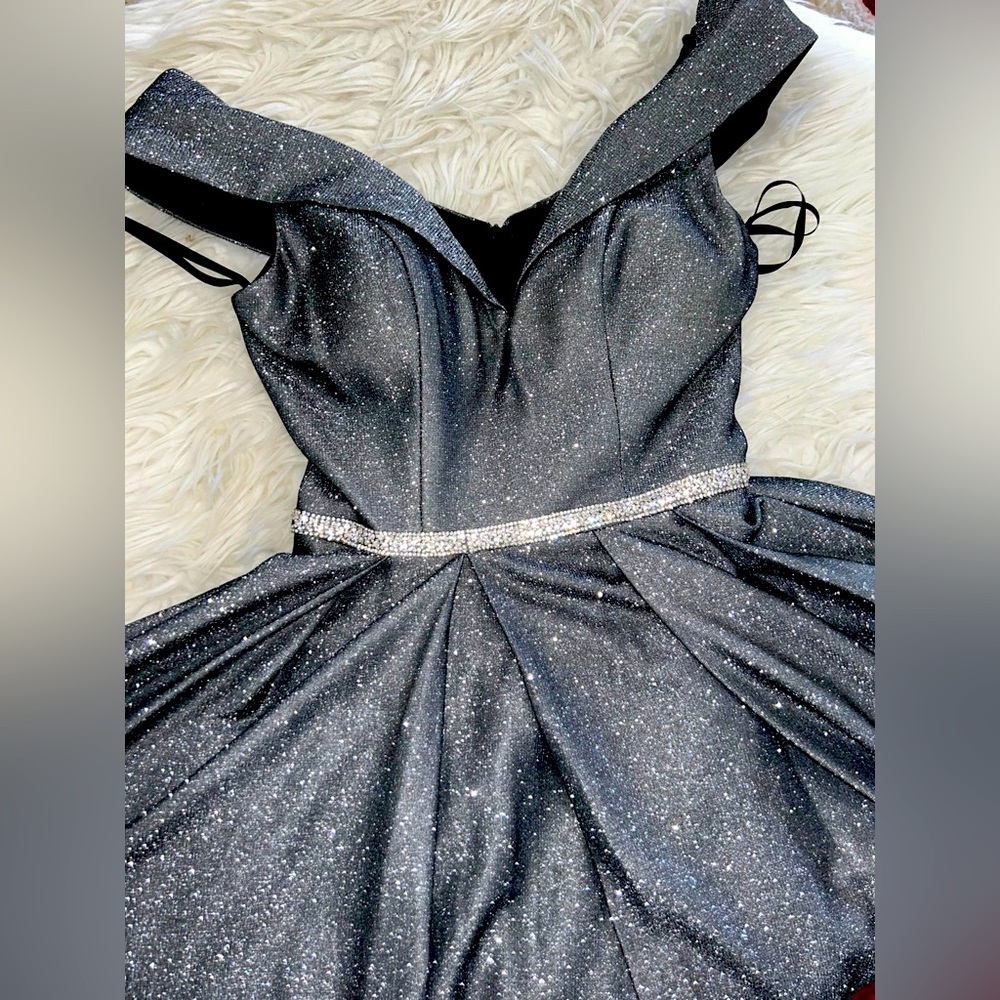 Look absolutely beautiful, Shoulder Gown, a little bit long from the back